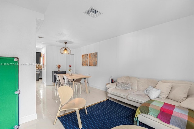 living room with light tile patterned flooring