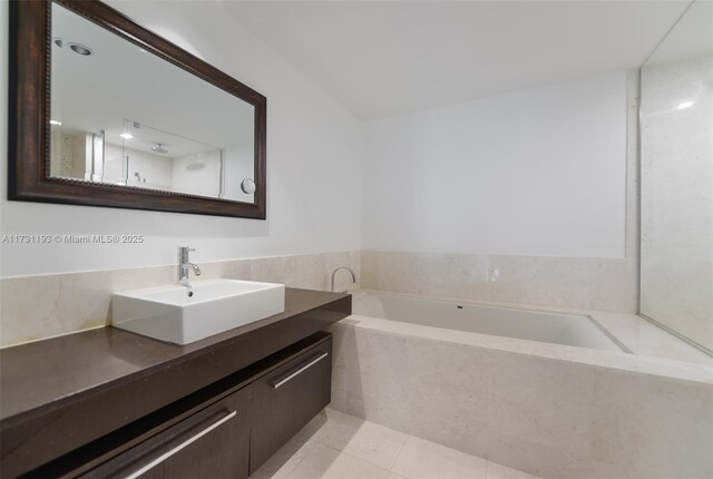 bathroom featuring a bidet, an enclosed shower, tile patterned floors, and toilet