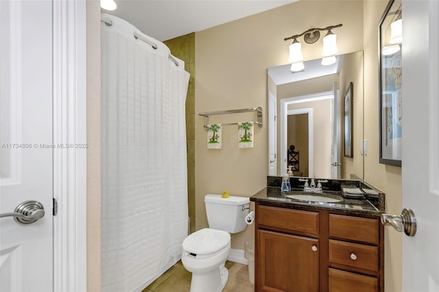 full bathroom with shower / tub combo with curtain, tile patterned floors, toilet, and vanity