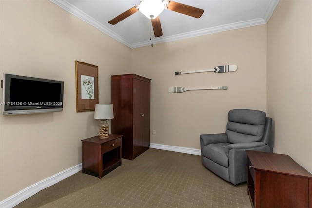 living area featuring crown molding and ceiling fan