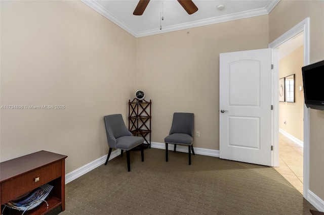 living area with ceiling fan and ornamental molding