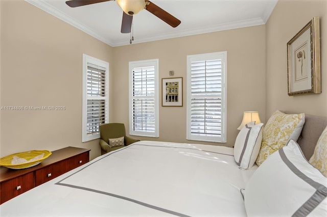 bedroom featuring ceiling fan and ornamental molding