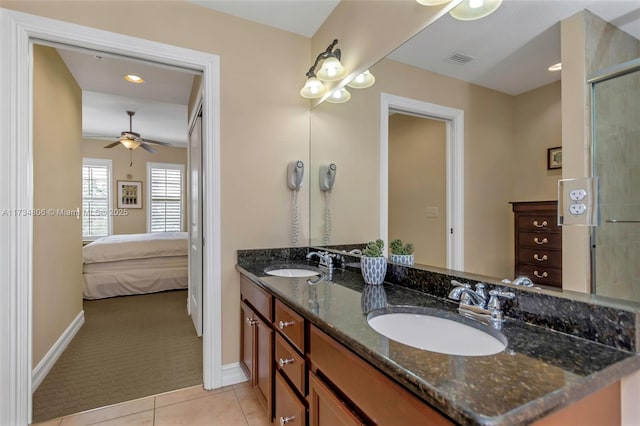 bathroom featuring vanity, tile patterned floors, and ceiling fan