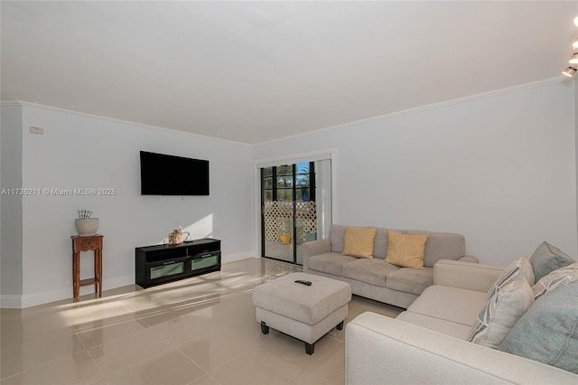 living room with ornamental molding and light tile patterned floors