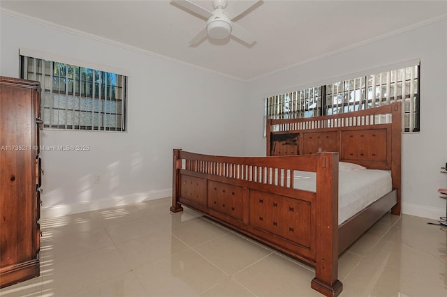 tiled bedroom featuring ornamental molding and ceiling fan