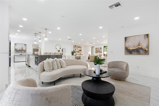 living room featuring sink