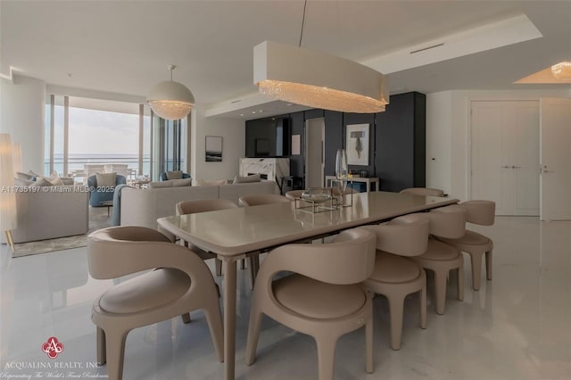 dining room featuring floor to ceiling windows