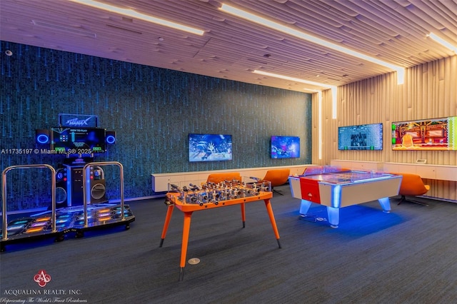 recreation room featuring wood ceiling