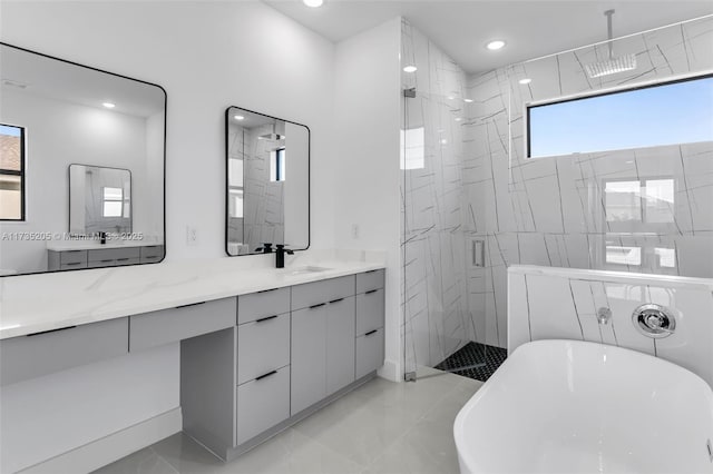 bathroom with plus walk in shower and vanity