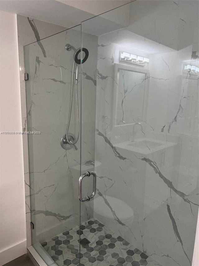 bathroom featuring walk in shower