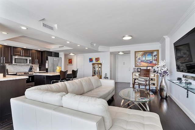 800 Parkview Dr Unit 1014, Hallandale Beach, FL 33009 - living area with visible vents, crown molding, baseboards, dark wood-style floors, and recessed lighting