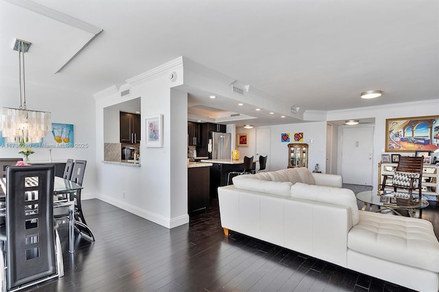 800 Parkview Dr Unit 1014, Hallandale Beach, FL 33009 - living area featuring visible vents, dark wood finished floors, baseboards, and a notable chandelier