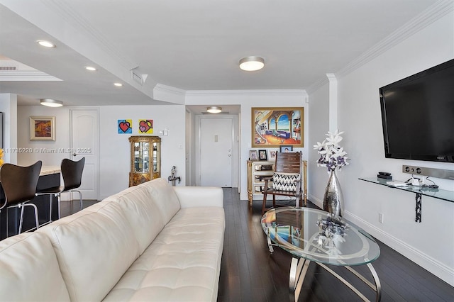 living room with hardwood / wood-style flooring and ornamental molding