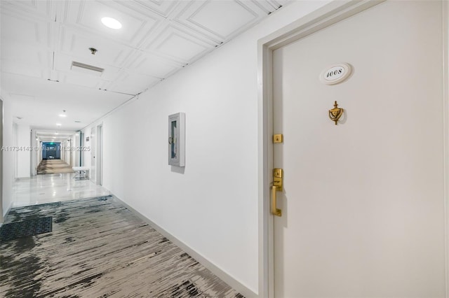 hallway featuring wood-type flooring