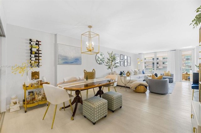 interior space with an inviting chandelier and light wood-type flooring