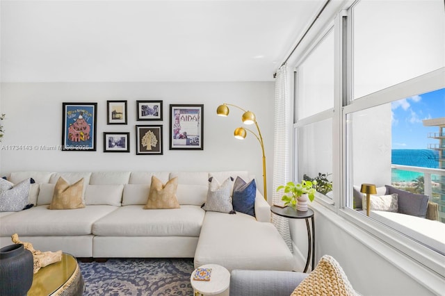 living room featuring a water view