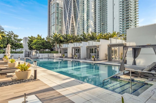 view of swimming pool with a patio