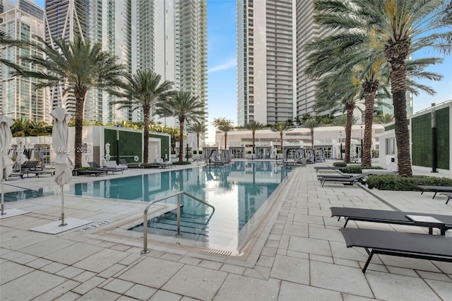 view of swimming pool featuring a patio area