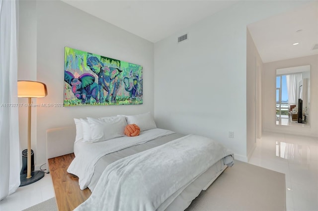 bedroom featuring light hardwood / wood-style floors