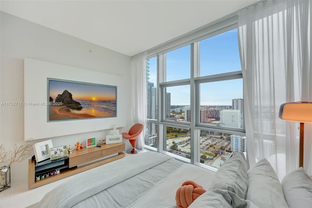 bedroom with floor to ceiling windows