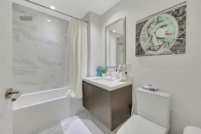 full bathroom with vanity, shower / tub combo with curtain, and toilet