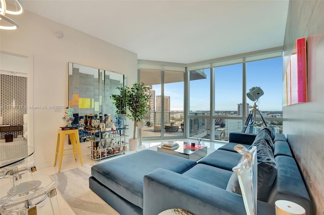 living room featuring floor to ceiling windows