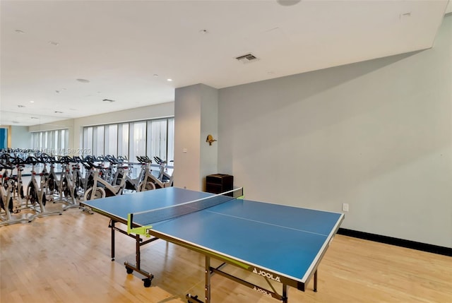 game room featuring light wood-type flooring