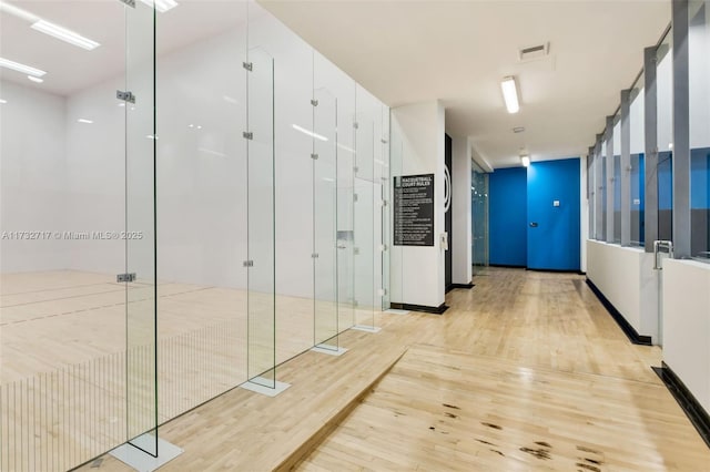 hallway featuring light hardwood / wood-style floors