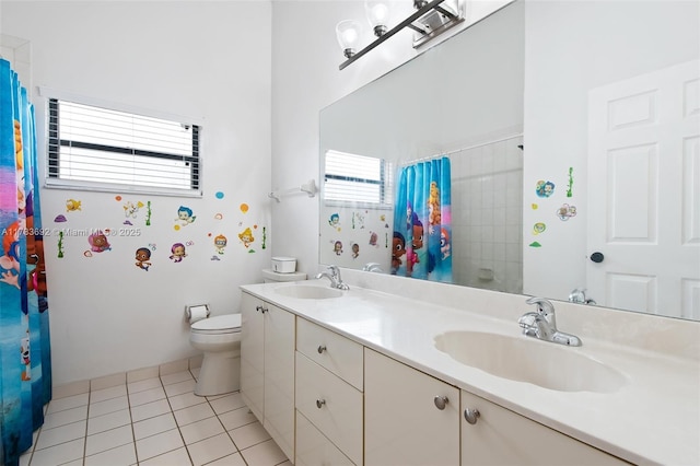 bathroom featuring a shower with shower curtain, vanity, toilet, and tile patterned flooring