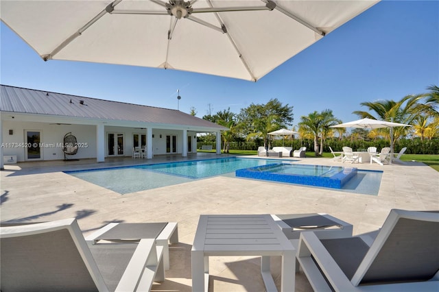 view of pool with a patio area