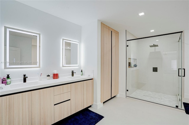 bathroom with vanity and walk in shower