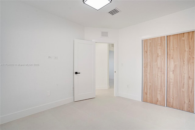 unfurnished bedroom featuring a closet