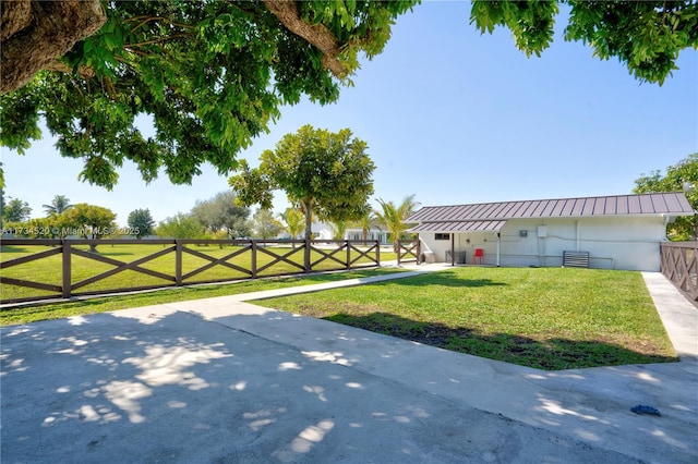 exterior space featuring a lawn