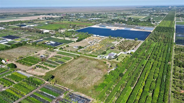 birds eye view of property featuring a rural view