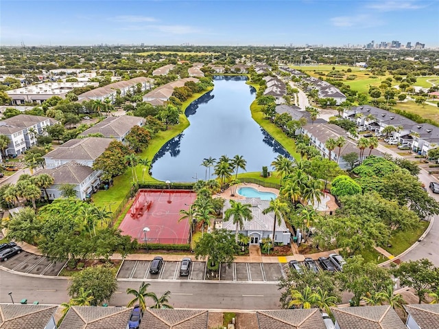 drone / aerial view with a water view