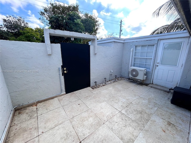 view of patio / terrace with ac unit