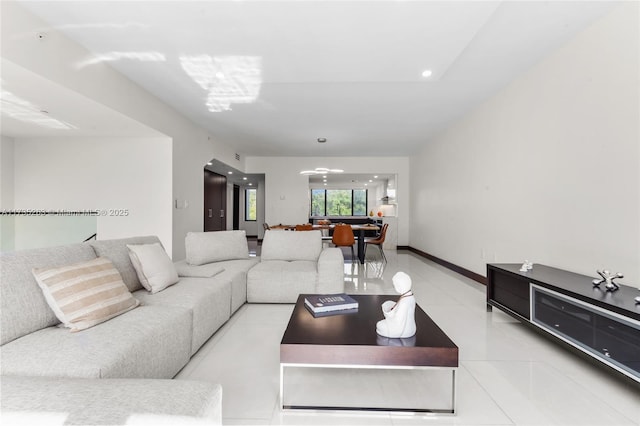 living room with light tile patterned flooring