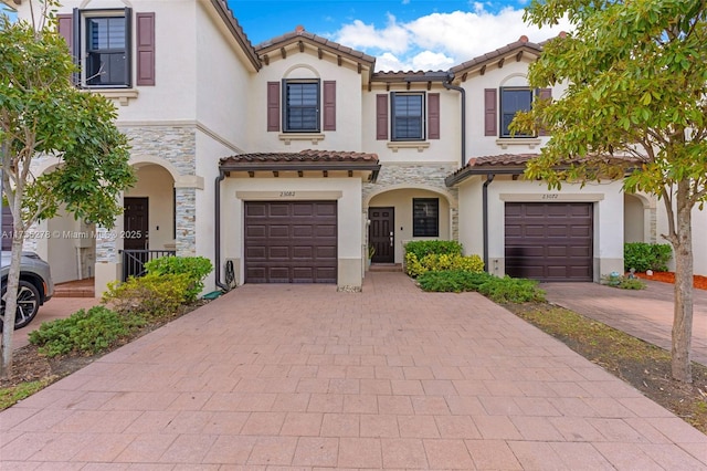 view of front of property with a garage