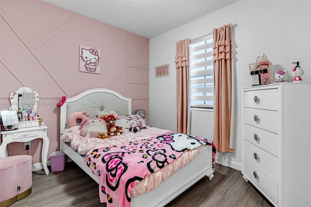 bedroom featuring dark hardwood / wood-style flooring