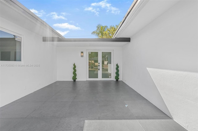 view of patio / terrace featuring french doors