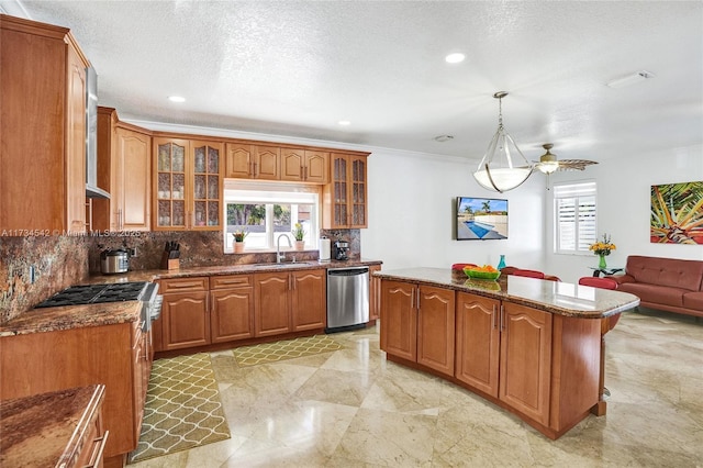 kitchen with decorative light fixtures, tasteful backsplash, dishwasher, sink, and a center island