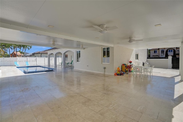 view of pool featuring ceiling fan