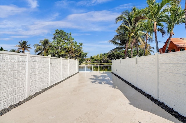 view of patio / terrace with a water view