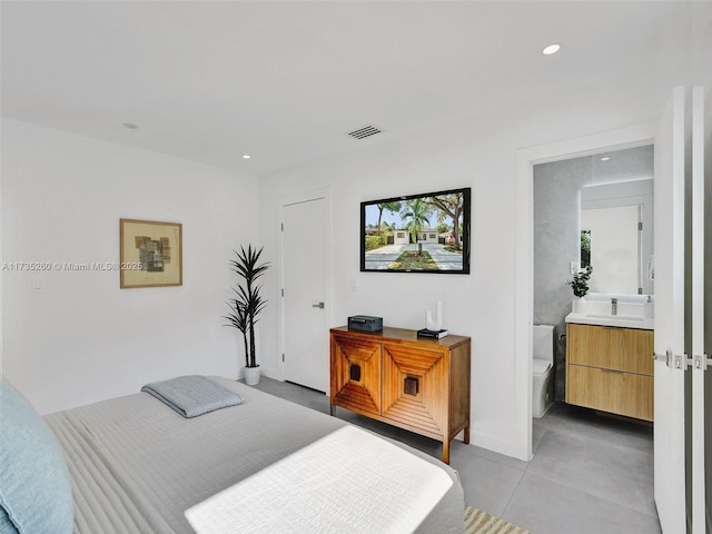 bedroom with ensuite bath