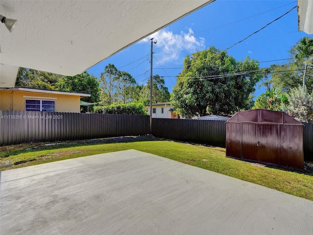 view of patio with a shed