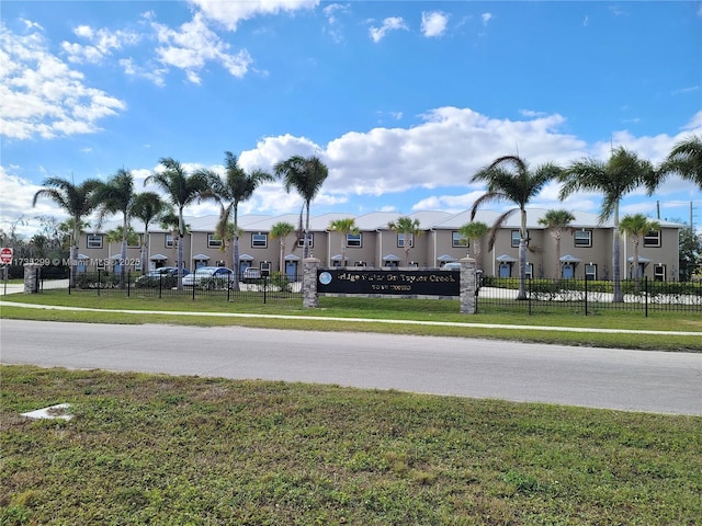 view of street with sidewalks and a residential view