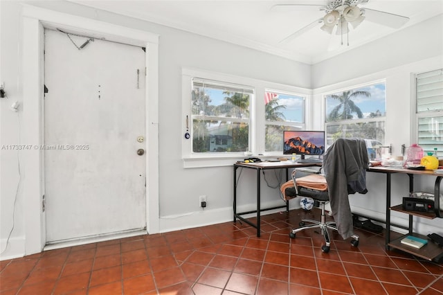 tiled home office featuring ornamental molding and ceiling fan