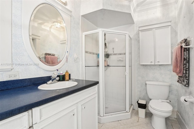 bathroom featuring a shower with door, vanity, and toilet