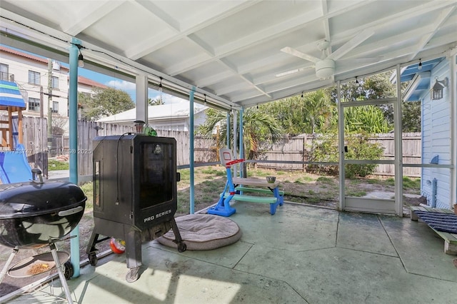 sunroom / solarium with ceiling fan