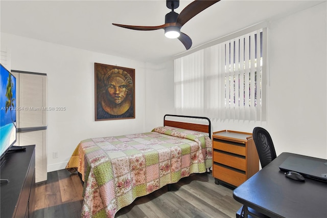 bedroom featuring hardwood / wood-style flooring and ceiling fan